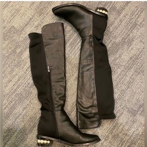 Catherine Malendrino riding Knee high pearl heeled boots with zipper